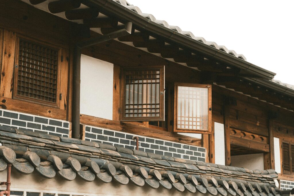 small study group ordering food in Korean in traditional Korean house, modern style, realistic high quality photo